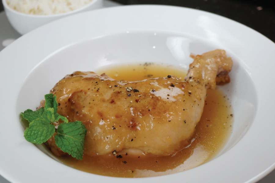 Chicken thigh with drumstick in plum sauce